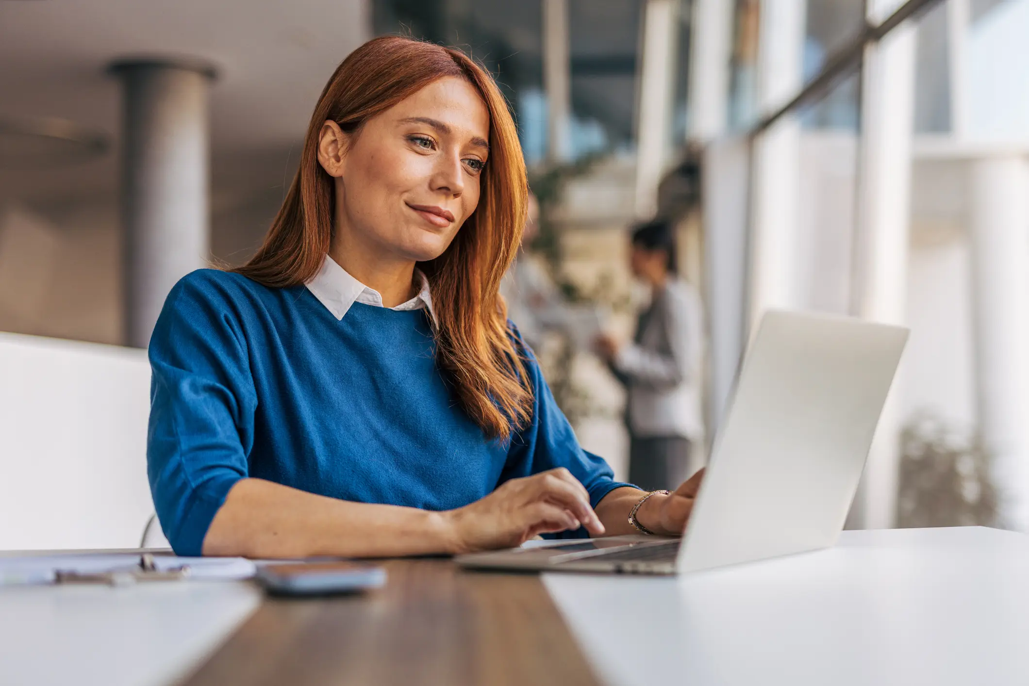 A woman using a laptop